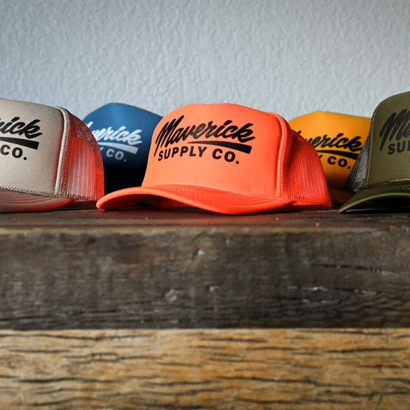 Black on Neon Orange Trucker Hat